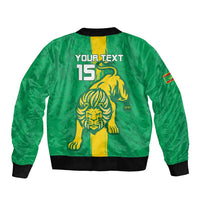 Green football bomber jacket back with YOUR TEXT 15, lion graphic, black ribbed hem and cuffs