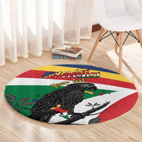 Round rug with multi-color flag stripes and black parrot artwork