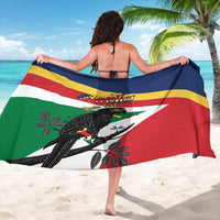 Back-tie Seychelles parrot sarong coat with crest emblem and striped panels
