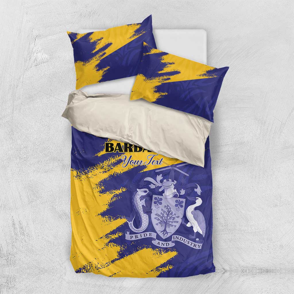 Folded bedding set showing blue and yellow duvet and two pillowcases with crest