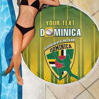 Round Dominica cricket beach blanket with printed crest, green-yellow stripes, white fringe