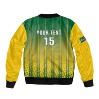 Green and yellow cricket bomber jacket with ribbed hem and back print, including number 15
