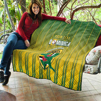 Green and yellow Dominica cricket quilt draped over cushions, quilted with custom text