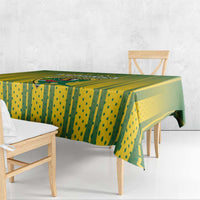 Rectangular green and yellow cricket-themed tablecloth with striped and dot pattern