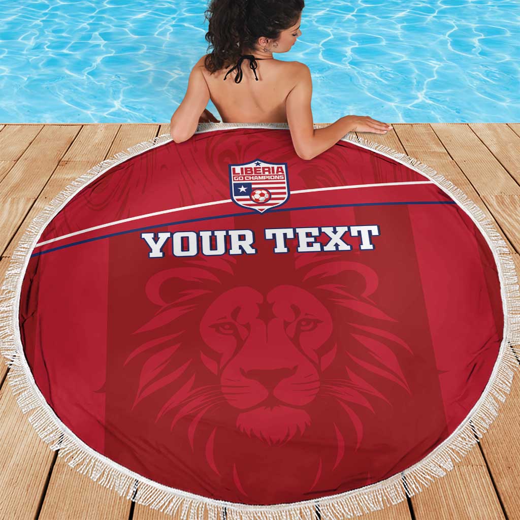 Red round beach blanket with white fringe, Liberia crest and 'YOUR TEXT' on lion graphic.