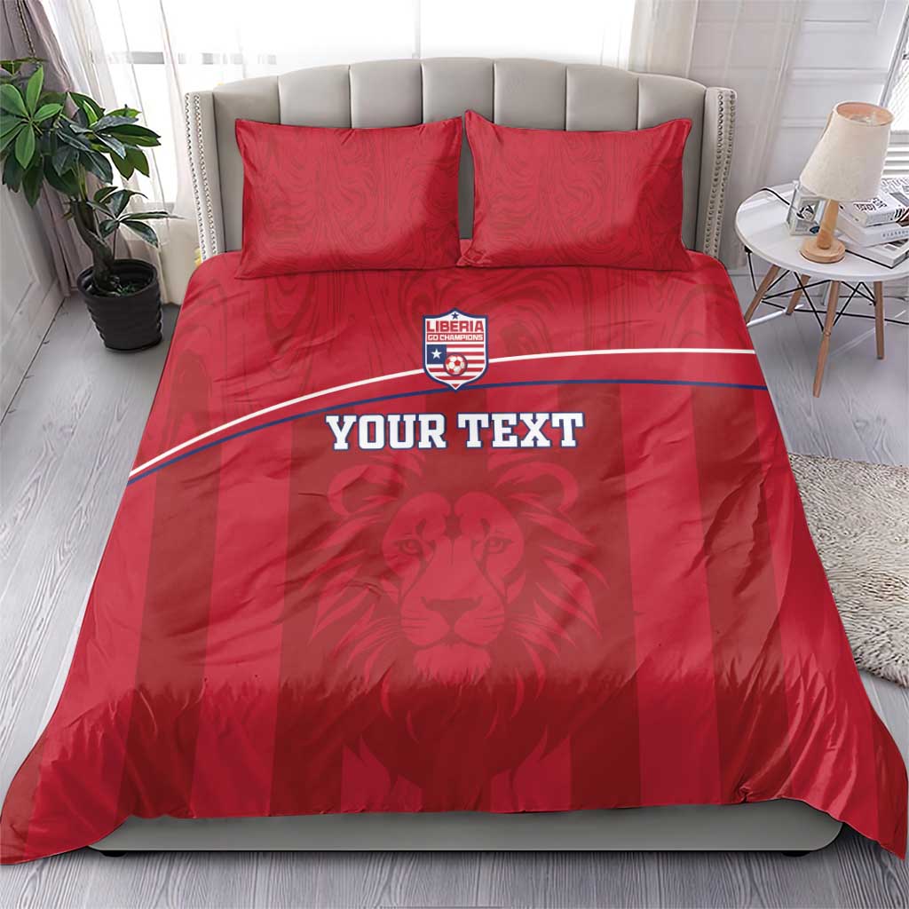 Red bedding set with Liberia lion crest, white curved stripe, and two pillows