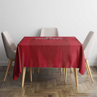 Red custom tablecloth with Liberia lion mascot emblem on square dining table