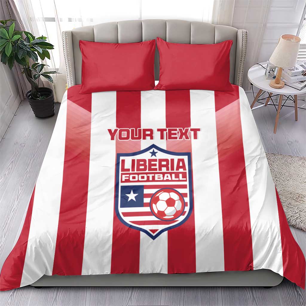 Red and white striped duvet set with two red pillowcases featuring Liberia Football crest