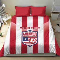 Red and white striped duvet bedding set with two red pillowcases and Liberia Football crest