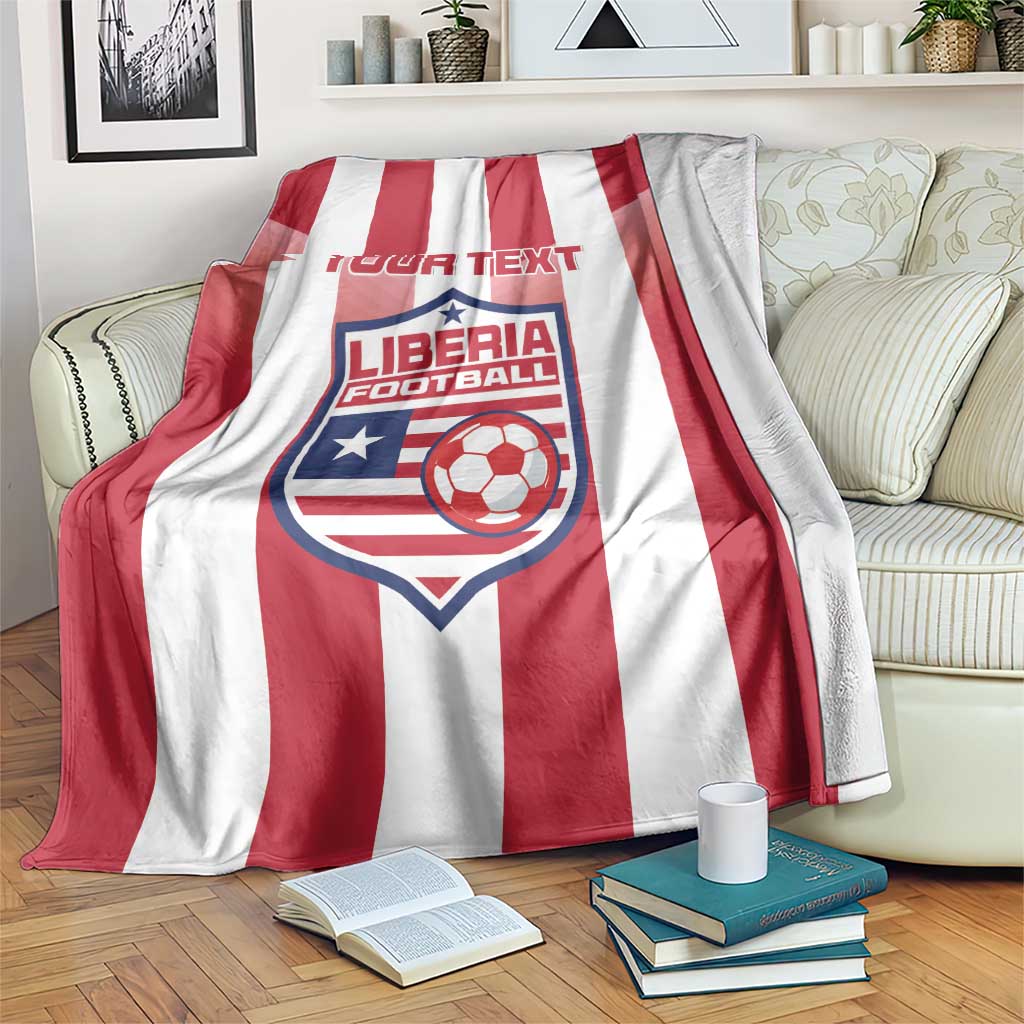Red-and-white striped football blanket with Liberia crest and custom text