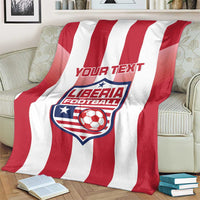 Red-and-white striped football blanket with Liberia crest and custom text, close view