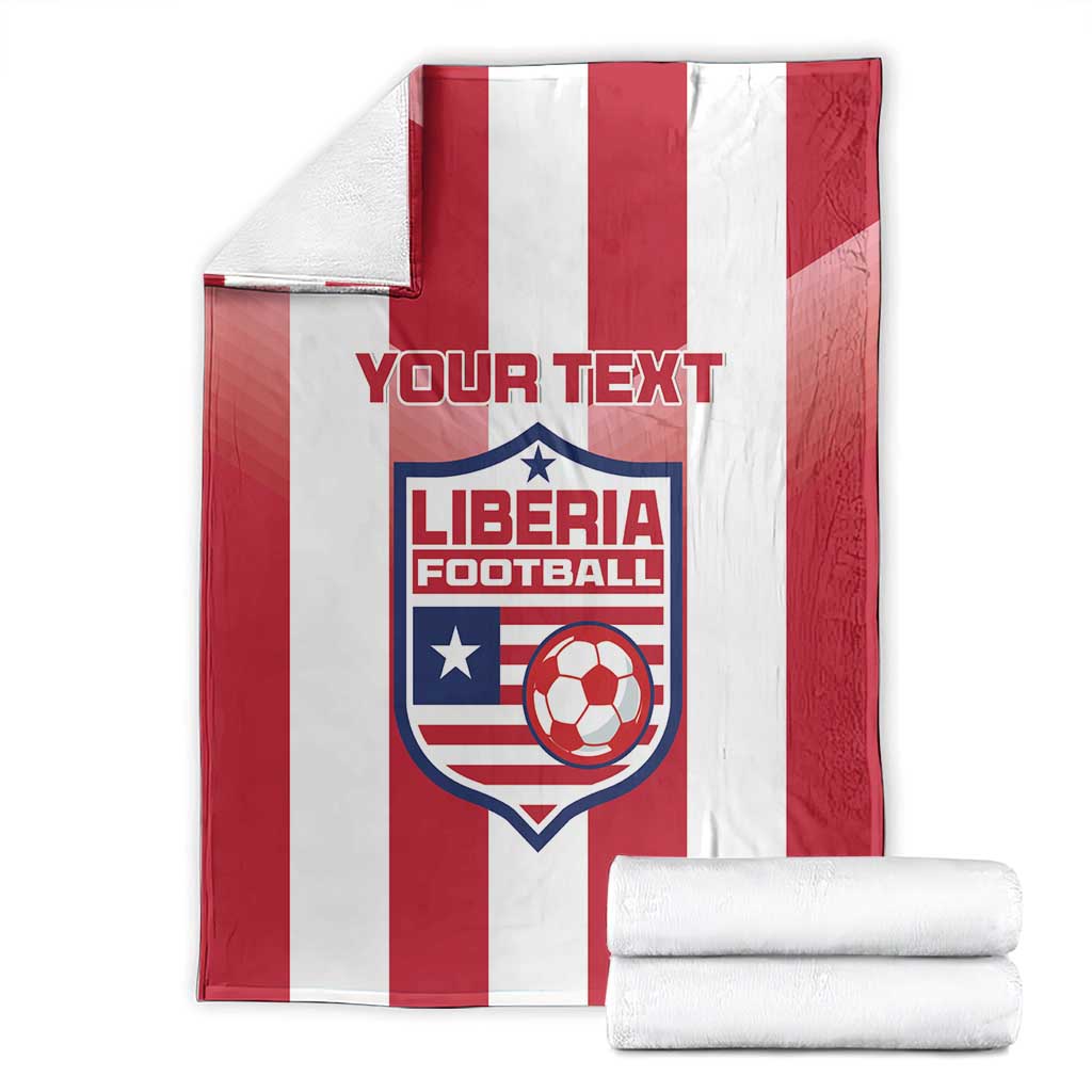 Red-and-white striped football blanket with Liberia crest and custom text, folded