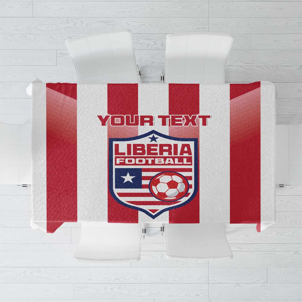 Red and white striped football tablecloth with Liberia crest centered on top.
