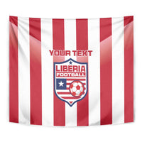 Tight view of custom Liberia football tapestry showing red and white stripes and central crest