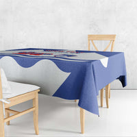 Blue and white Slovenia flag tablecloth draped over a dining bench