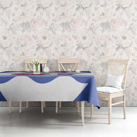 Blue and white Slovenia flag tablecloth on dining table with floral backdrop