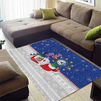 Blue Christmas rug with Santa figure and starry snow pattern plus gray striped side