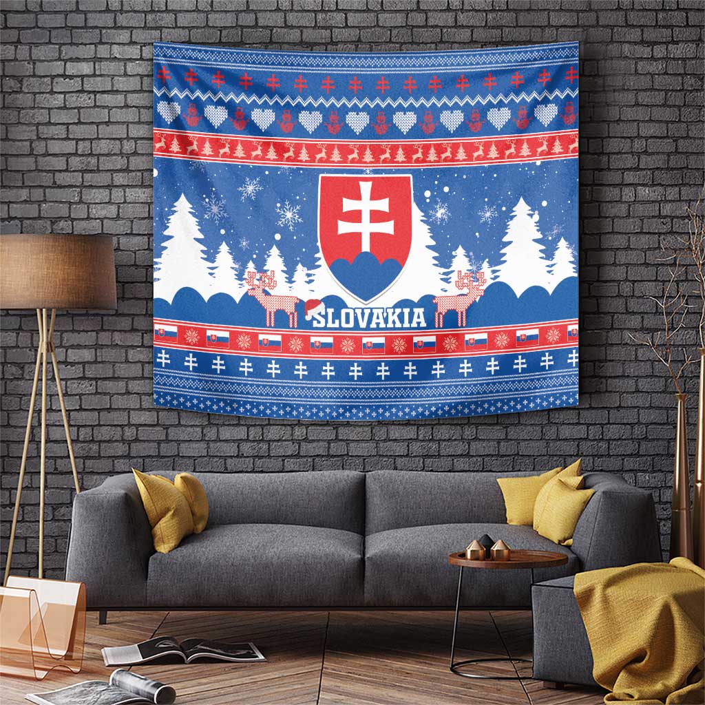 Blue Christmas tapestry with Slovakia coat of arms, snow, trees, and red border