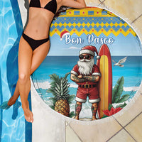 Round blue beach blanket with tassel fringe and Bon Pasco surf Santa center print
