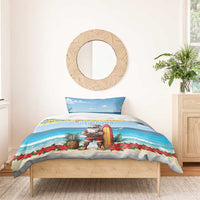 Blue Christmas bedding set with surfing Santa, Bon Pasco text, pillow and duvet