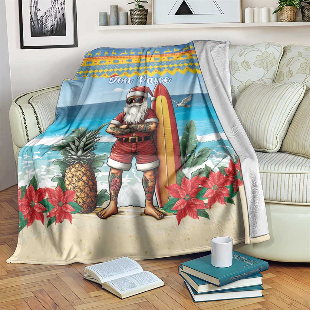 Blue Christmas blanket with surfer Santa, surfboard, pineapples, and poinsettias