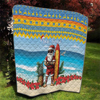 Blue Christmas quilt with surfing Santa, “Bon Pasco” text, pineapple and poinsettias