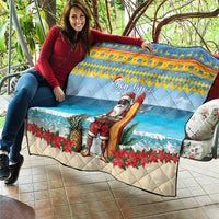 Blue quilt with surfing Santa and surfboard, “Bon Pasco” script, poinsettias and pineapple