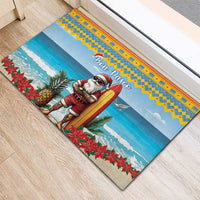 Blue Christmas rubber doormat corner view showing Santa surfing and “Bon Pasco”