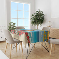 Christmas tablecloth with blue ocean print and poinsettia leaf design