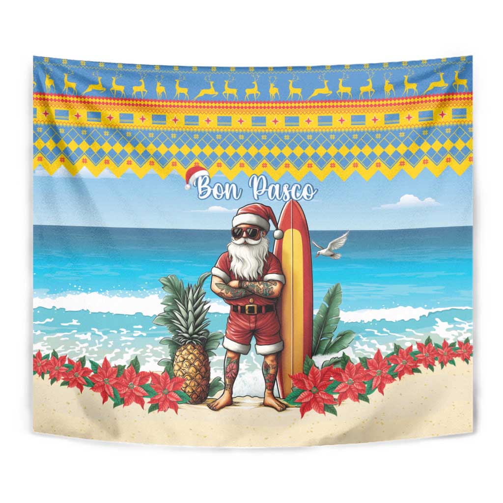 Christmas beach tapestry close-up: Santa holding a surfboard with "Bon Pasco" above.