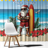 Blue holiday window curtain with Santa holding surfboard and Bon Pasco text