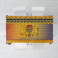 Blue and yellow tablecloth showing coat of arms and 'MERRY CHRISTMAS' text