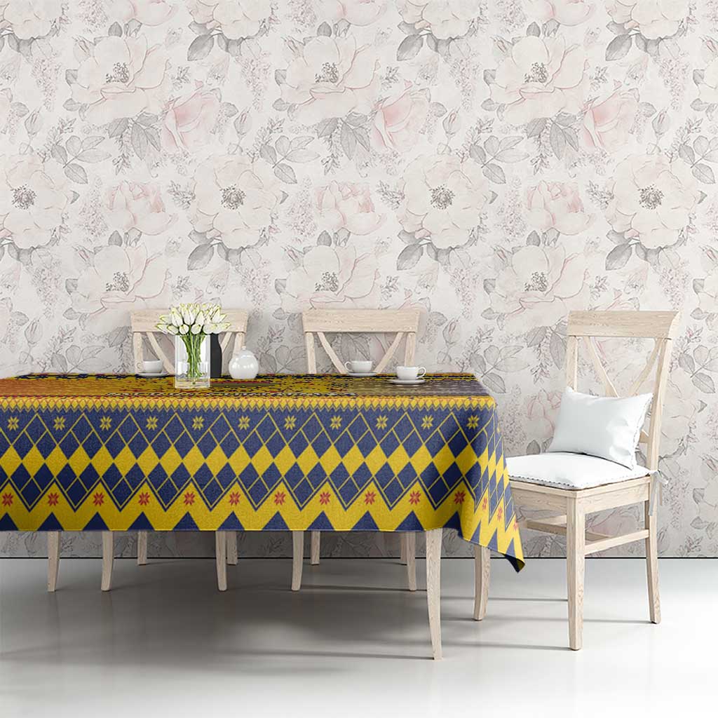 Blue and yellow geometric Christmas tablecloth with bold zigzag border