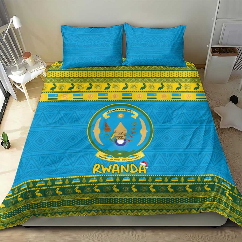Blue Rwanda bedding set with circular crest emblem and green pattern border, two pillowcases