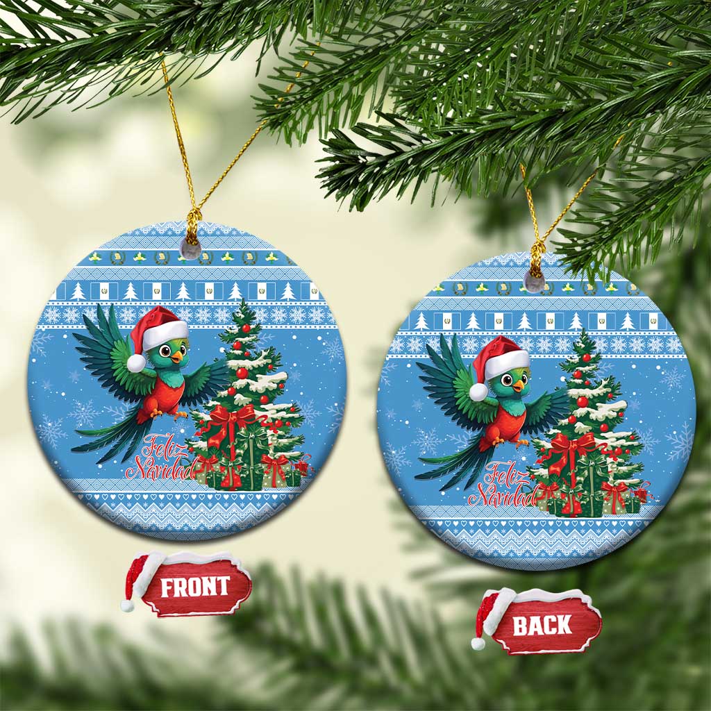 Blue ceramic Christmas ornament, round shape, quetzal bird with tree and Feliz Navidad text