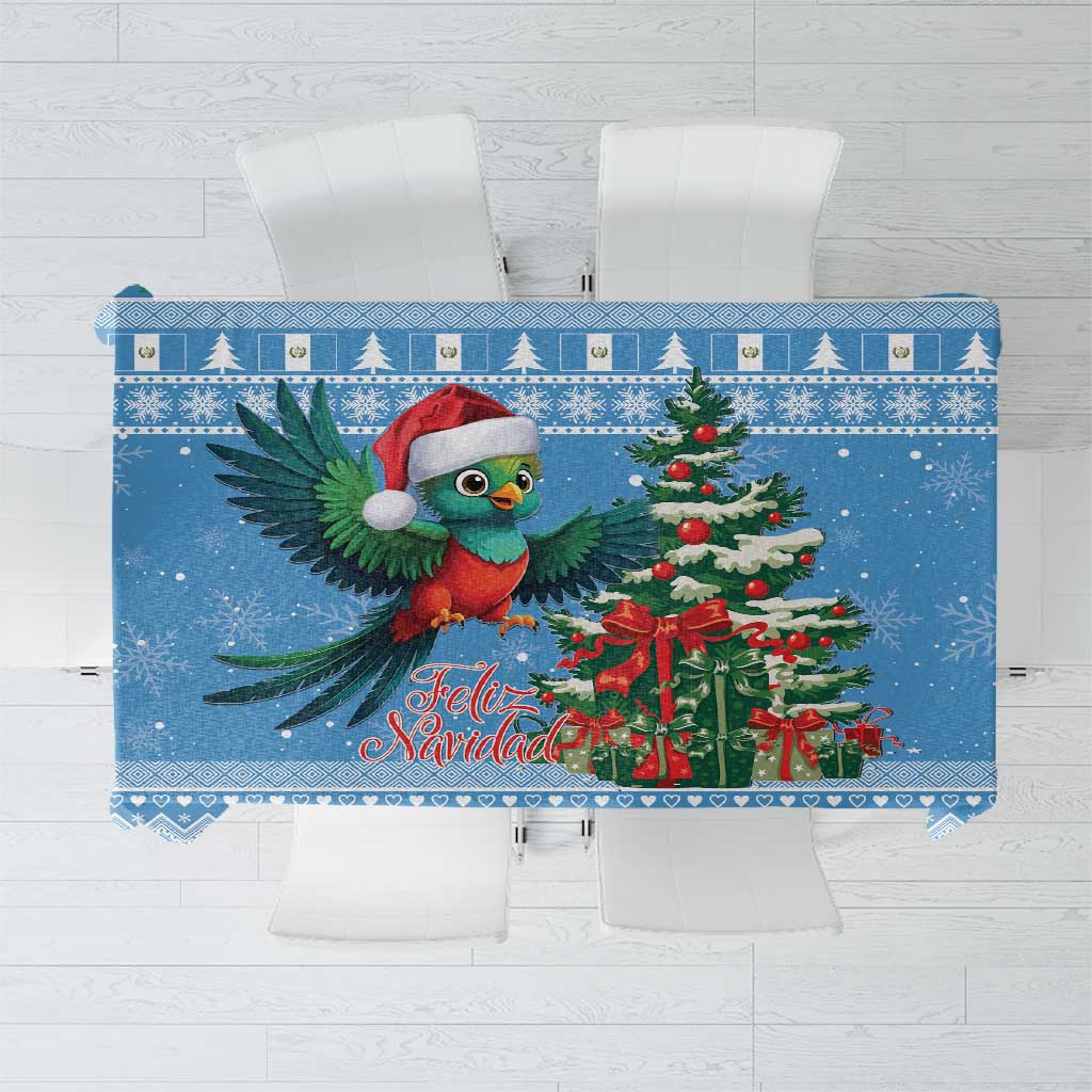 Blue Christmas tablecloth with quetzal bird and Feliz Navidad, snowy tree design