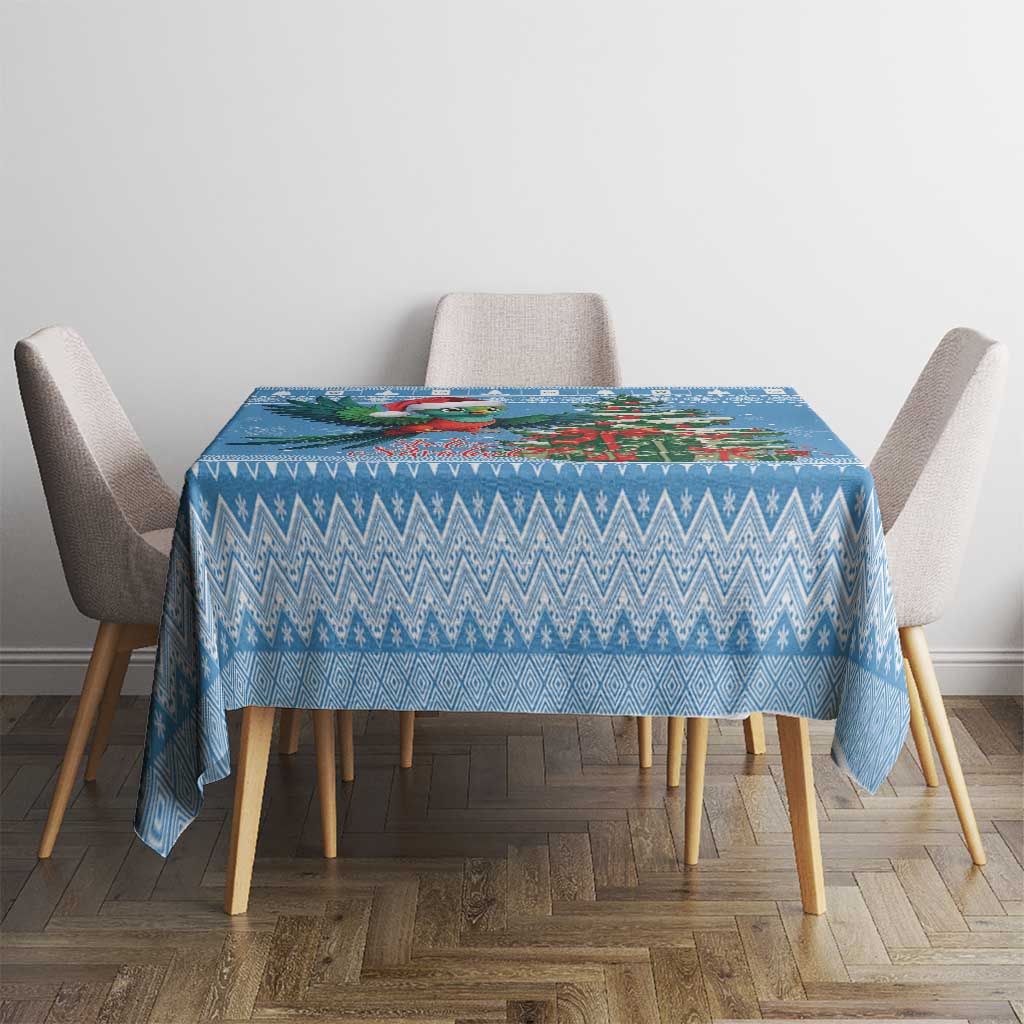 Blue Christmas tablecloth with zigzag and snowflake motifs, centered on dining table