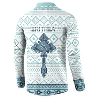 Back view of teal and white patterned button sweatshirt with navy cross graphic