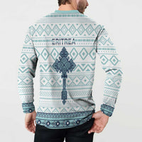 Back view on model: teal and white patterned button sweatshirt with navy motif