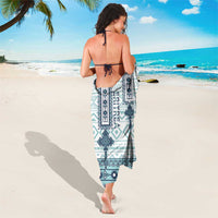 White cross-tile sarong with teal and navy central panel print