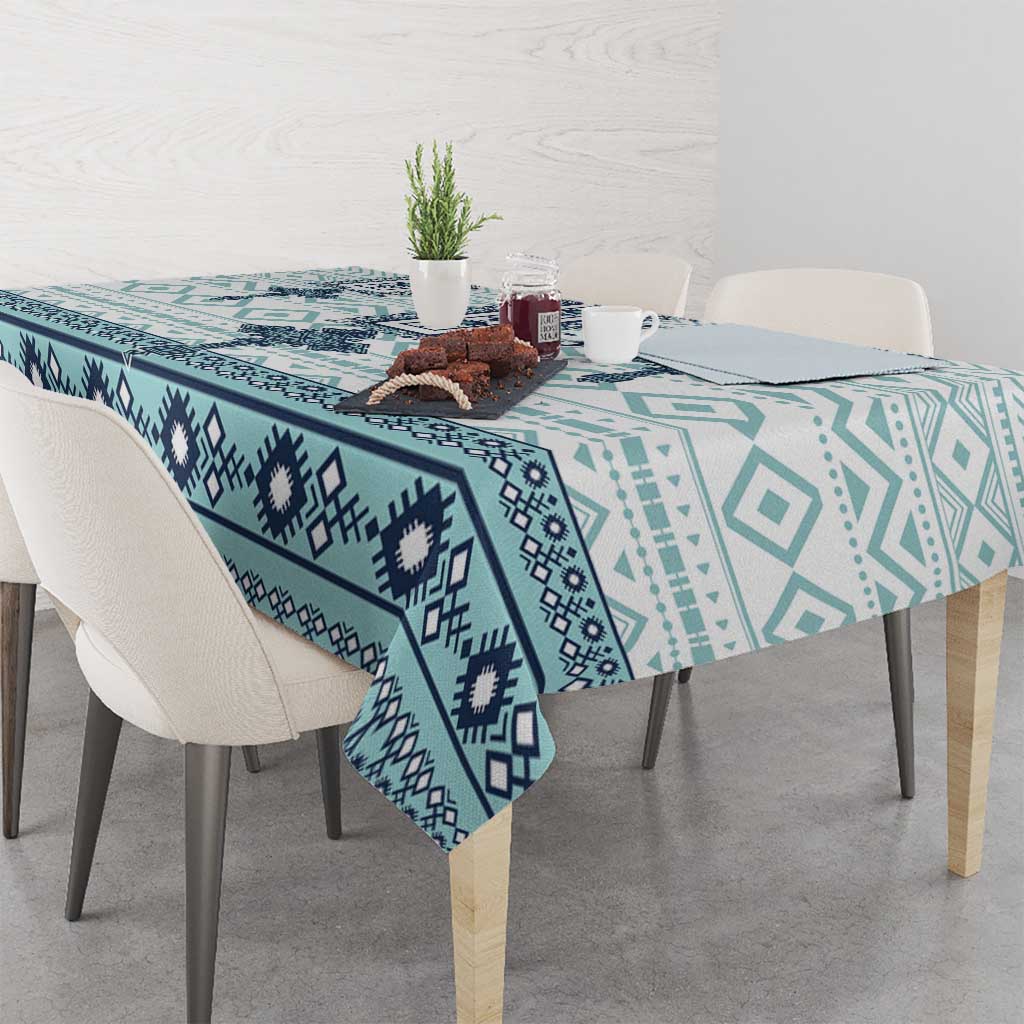 Teal and navy geometric tablecloth with repeating cross motifs and border stripe