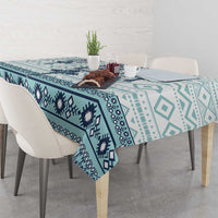 Teal and navy geometric tablecloth with repeating cross motifs and border stripe