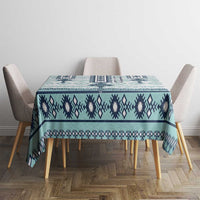 Square teal and navy geometric cross tablecloth with central motif and border pattern
