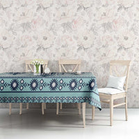 Teal and navy geometric cross tablecloth with diamond rows and patterned border hem