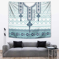 Eritrean cross tile tapestry with teal, blue, and white geometric borders, wall hanging