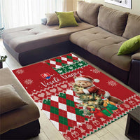 Red Christmas area rug on floor with bear artwork center and diamond argyle trim