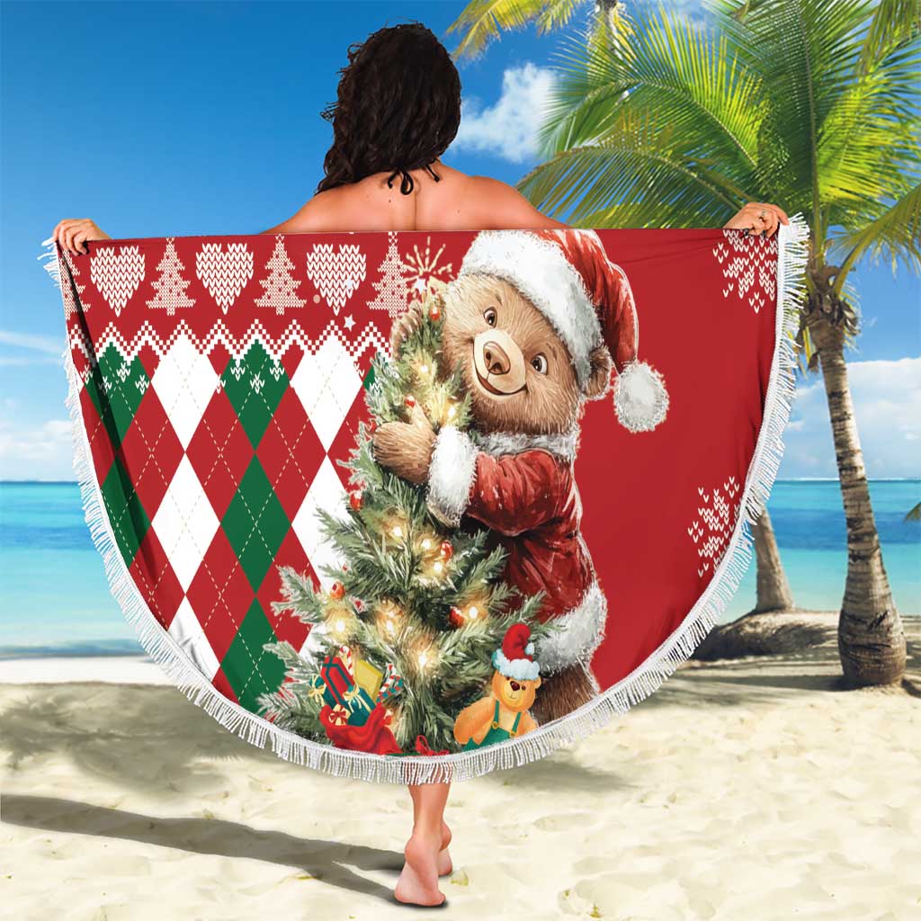 Round red Christmas beach blanket with bear Santa graphic, green argyle pattern, white fringe
