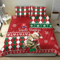Red Christmas duvet with teddy bear illustration, green/red argyle pillows, snowflake motifs