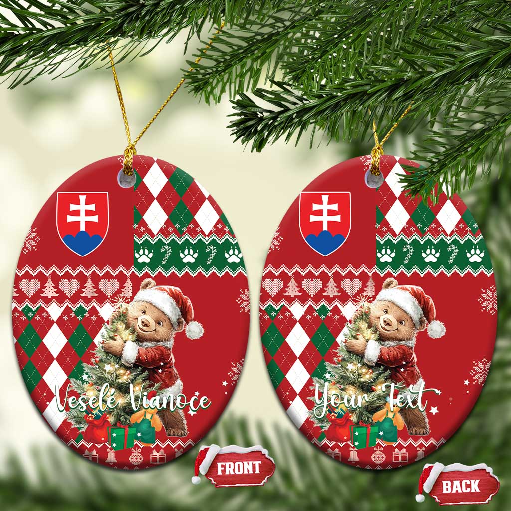 Two red ceramic circular Christmas ornaments with bear, argyle plaid and Slovak shield, gold hanging loops