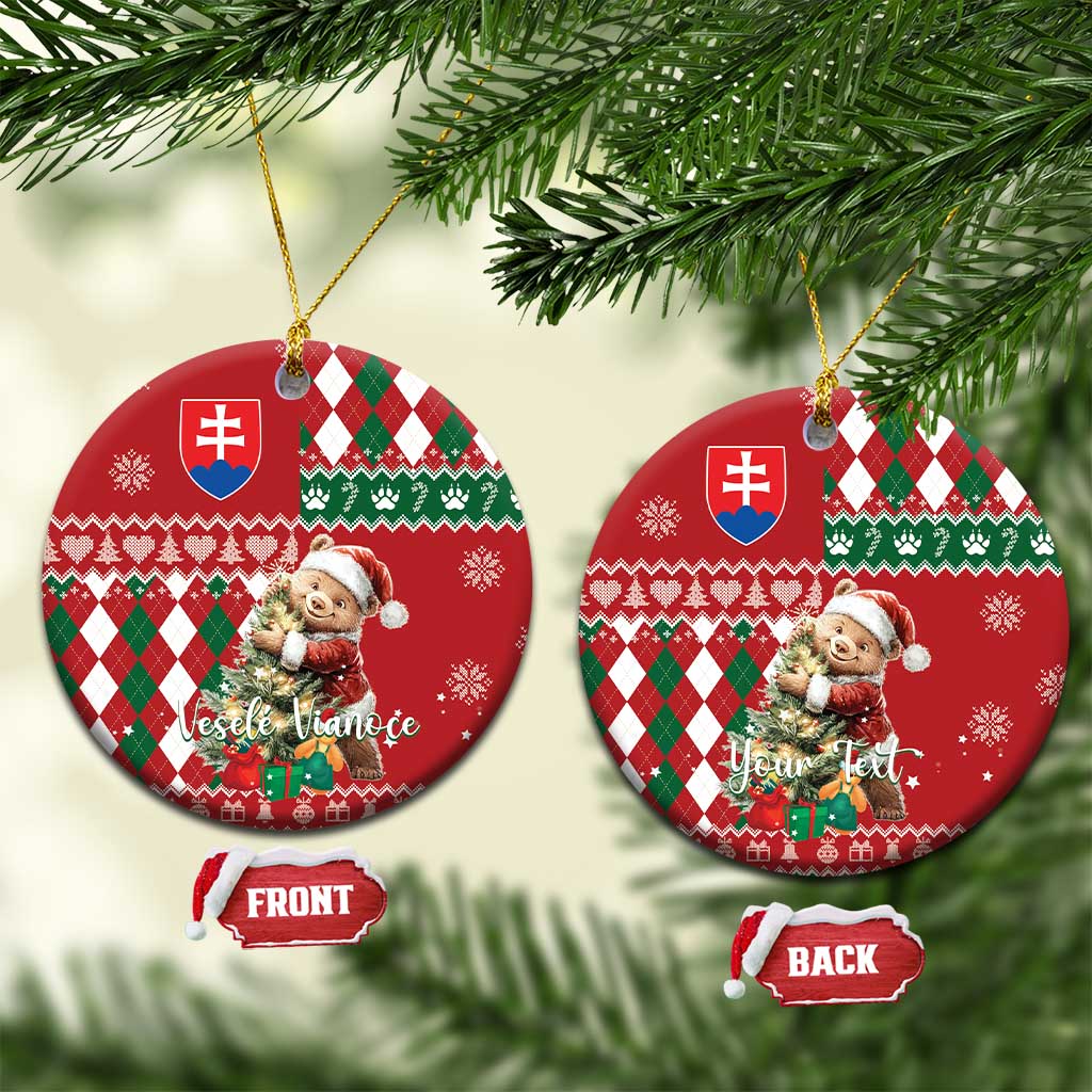 Red ceramic circular Christmas ornament with bear, argyle plaid, Slovak shield, gold hanging loop
